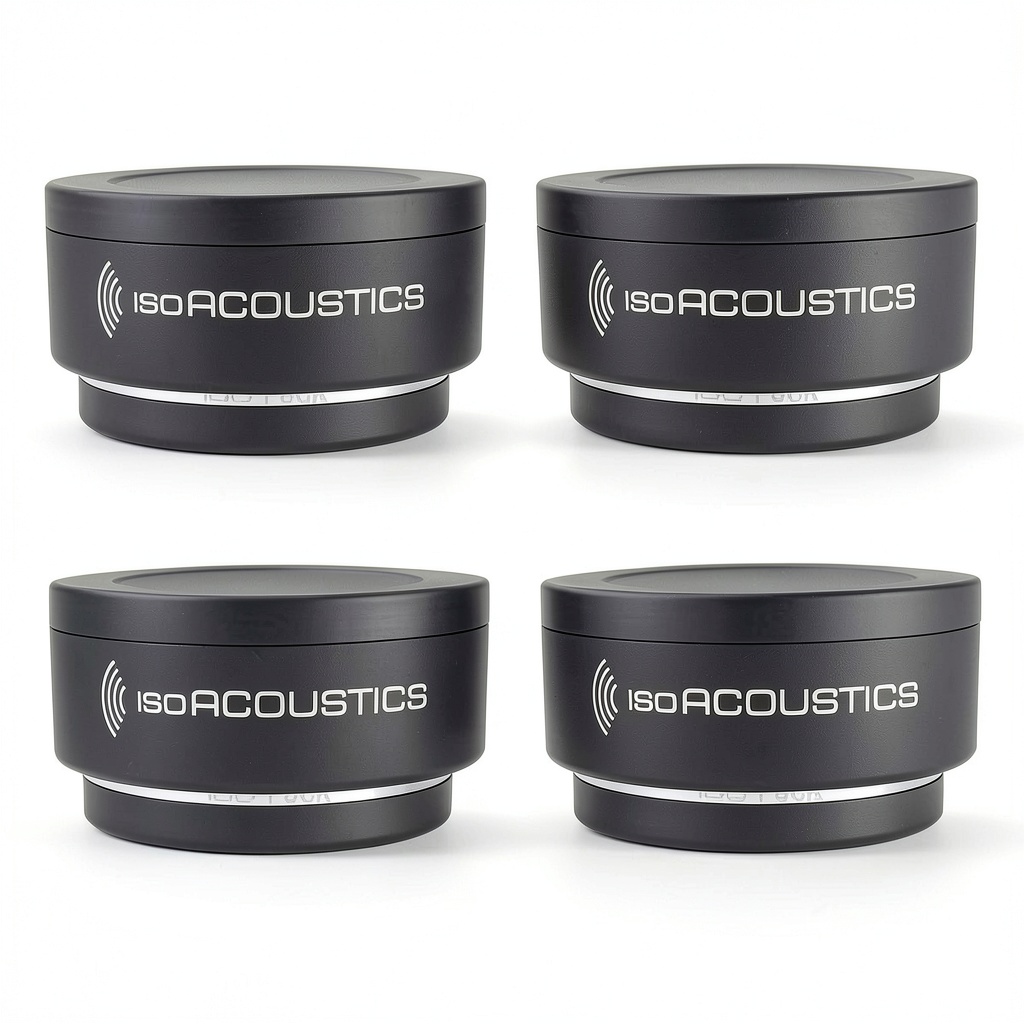 IsoAcoustics ISO-PUCK pucks installed under a studio monitor on a desk